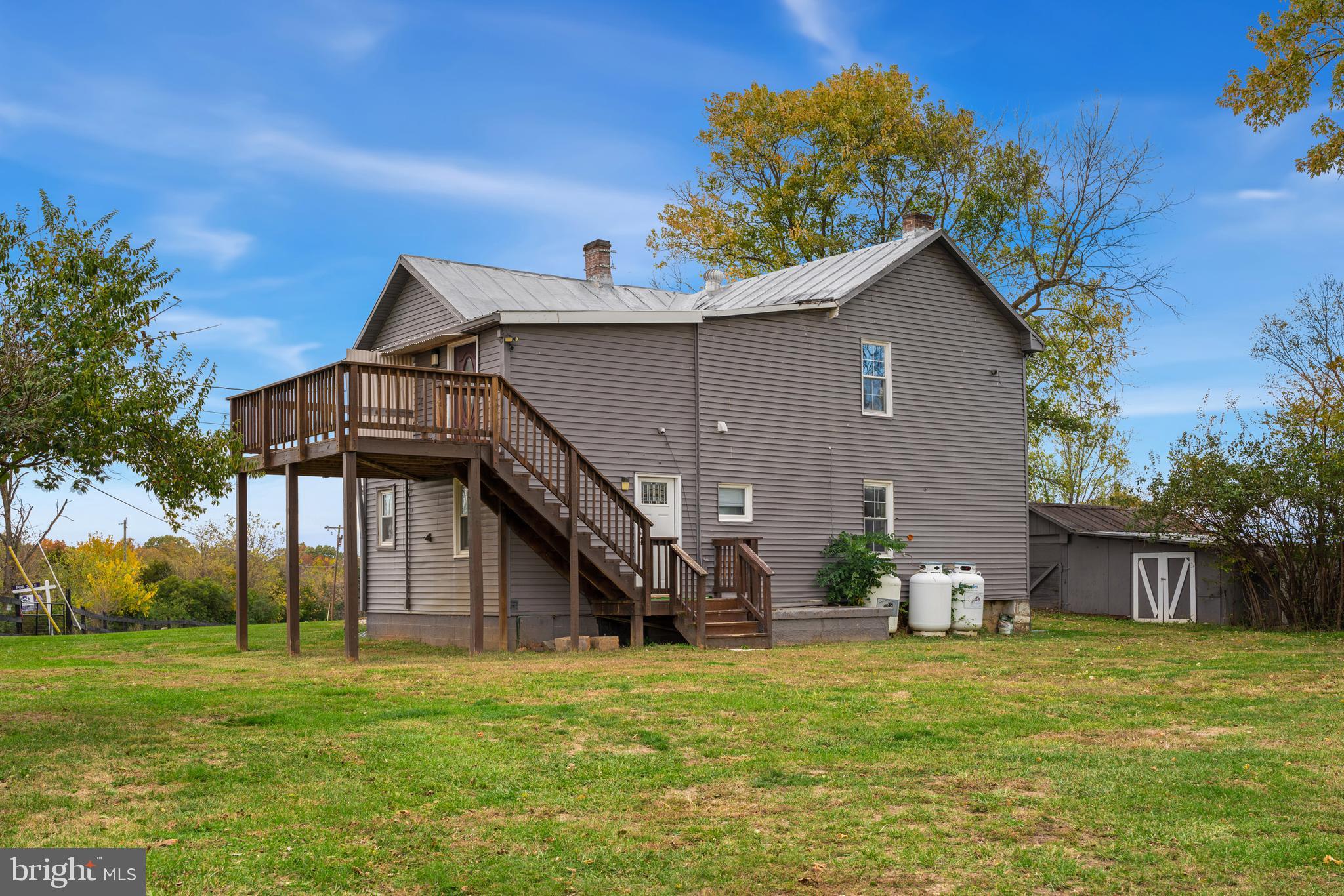 962 Wadesville Road Berryville, VA 22611 - Photo 15 of 63 a view of a house with a yard