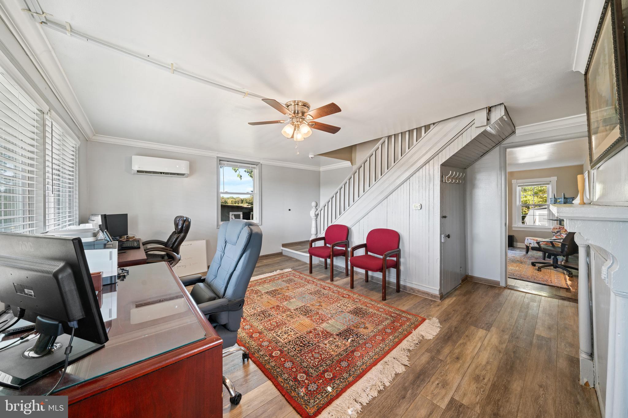 962 Wadesville Road Berryville, VA 22611 - Photo 17 of 63 a living room with furniture and a wooden floor