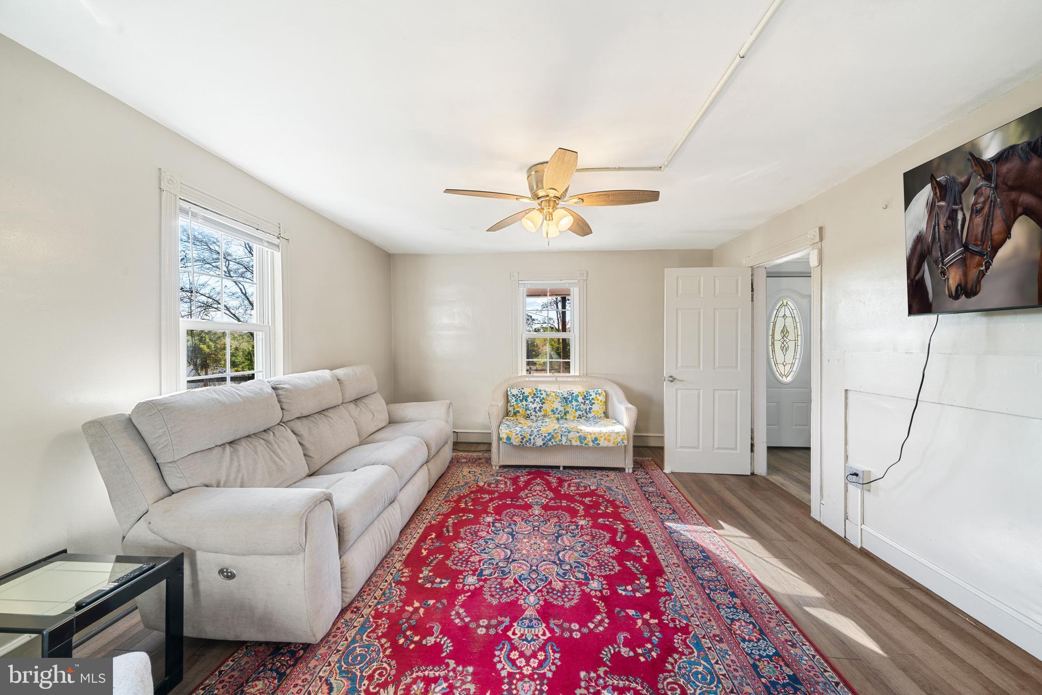 962 Wadesville Road Berryville, VA 22611 - Photo 22 of 63 a living room with furniture and a rug