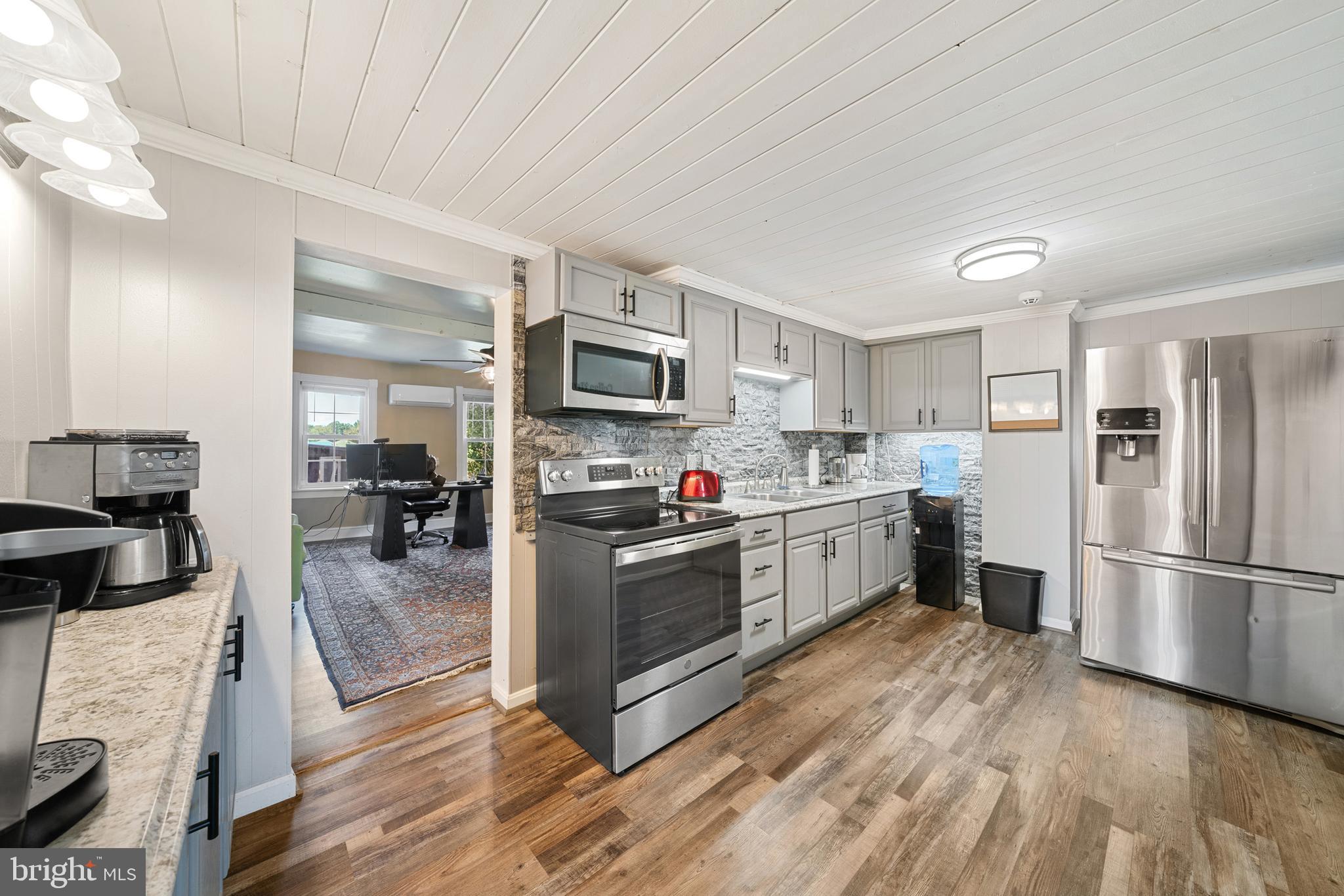 962 Wadesville Road Berryville, VA 22611 - Photo 26 of 63 Main level full kitchen, original wood ceiling