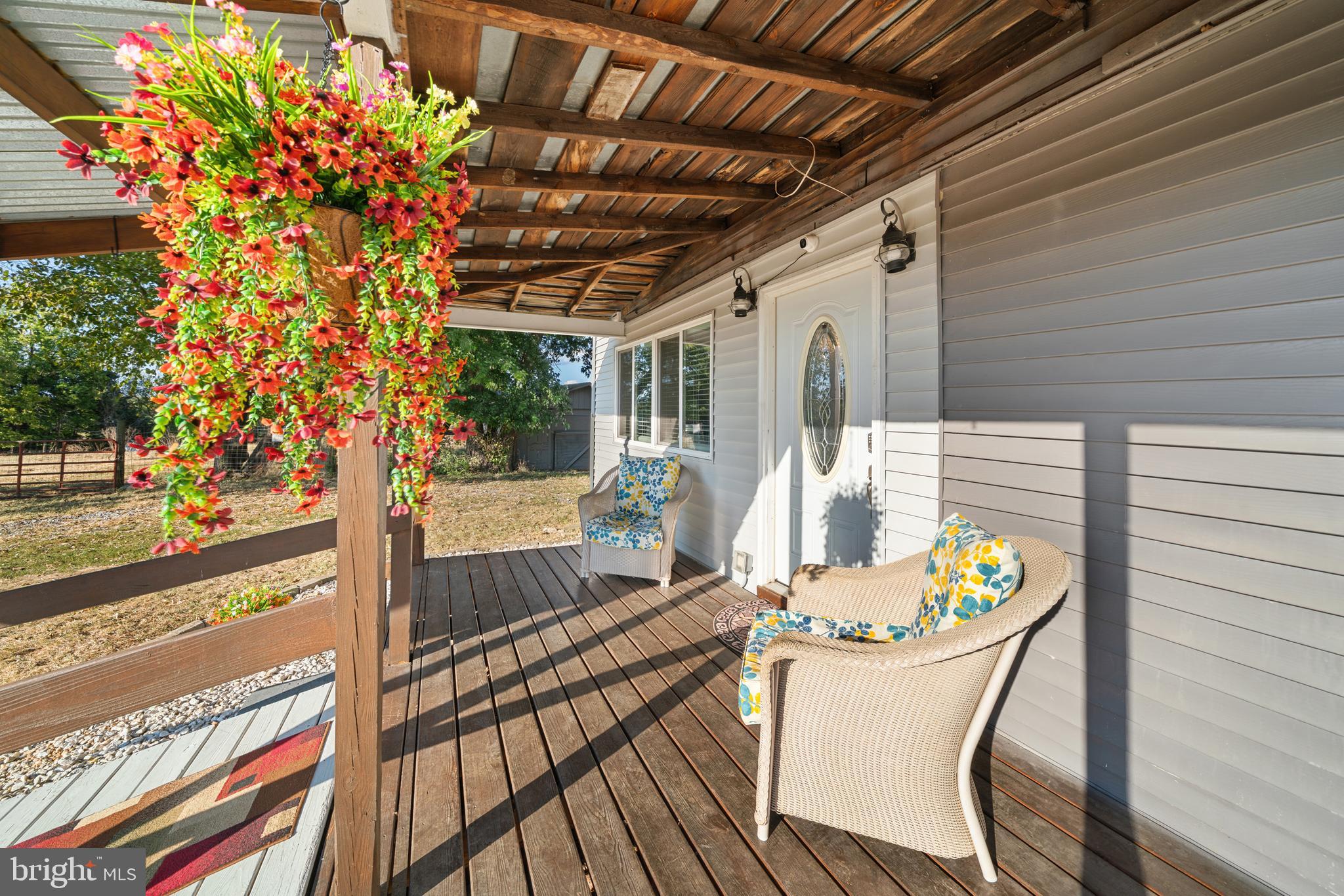 962 Wadesville Road Berryville, VA 22611 - Photo 3 of 63 a dining room with furniture and a potted plant