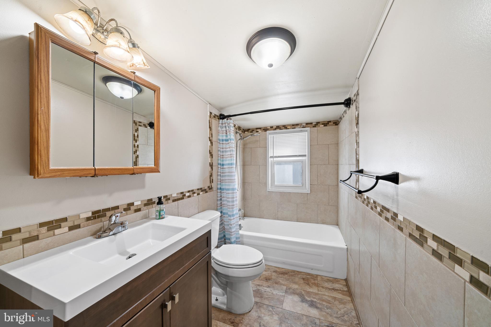 962 Wadesville Road Berryville, VA 22611 - Photo 42 of 63 a bathroom with a granite countertop sink toilet and shower