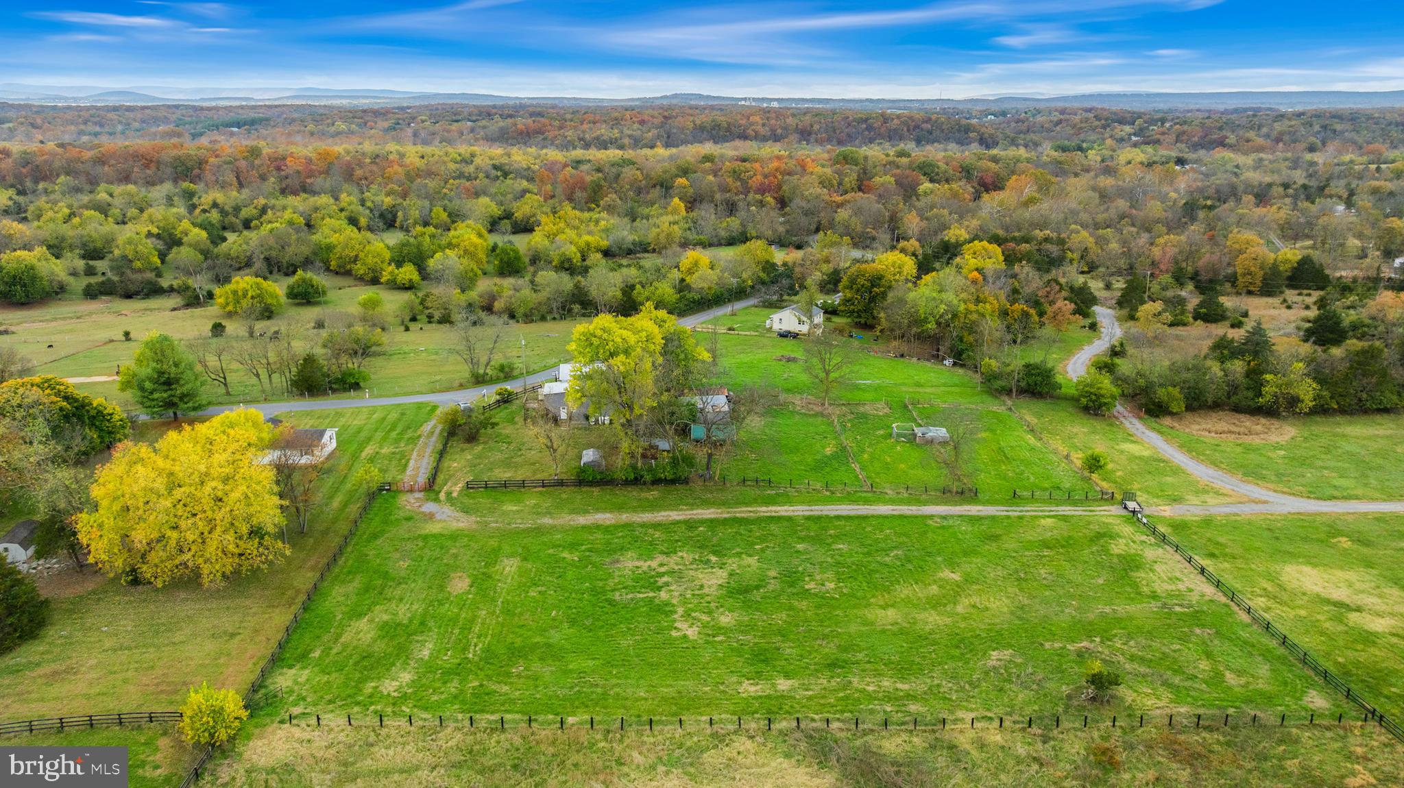 962 Wadesville Road Berryville, VA 22611 - Photo 57 of 63 an aerial view of residential houses with outdoor space and trees