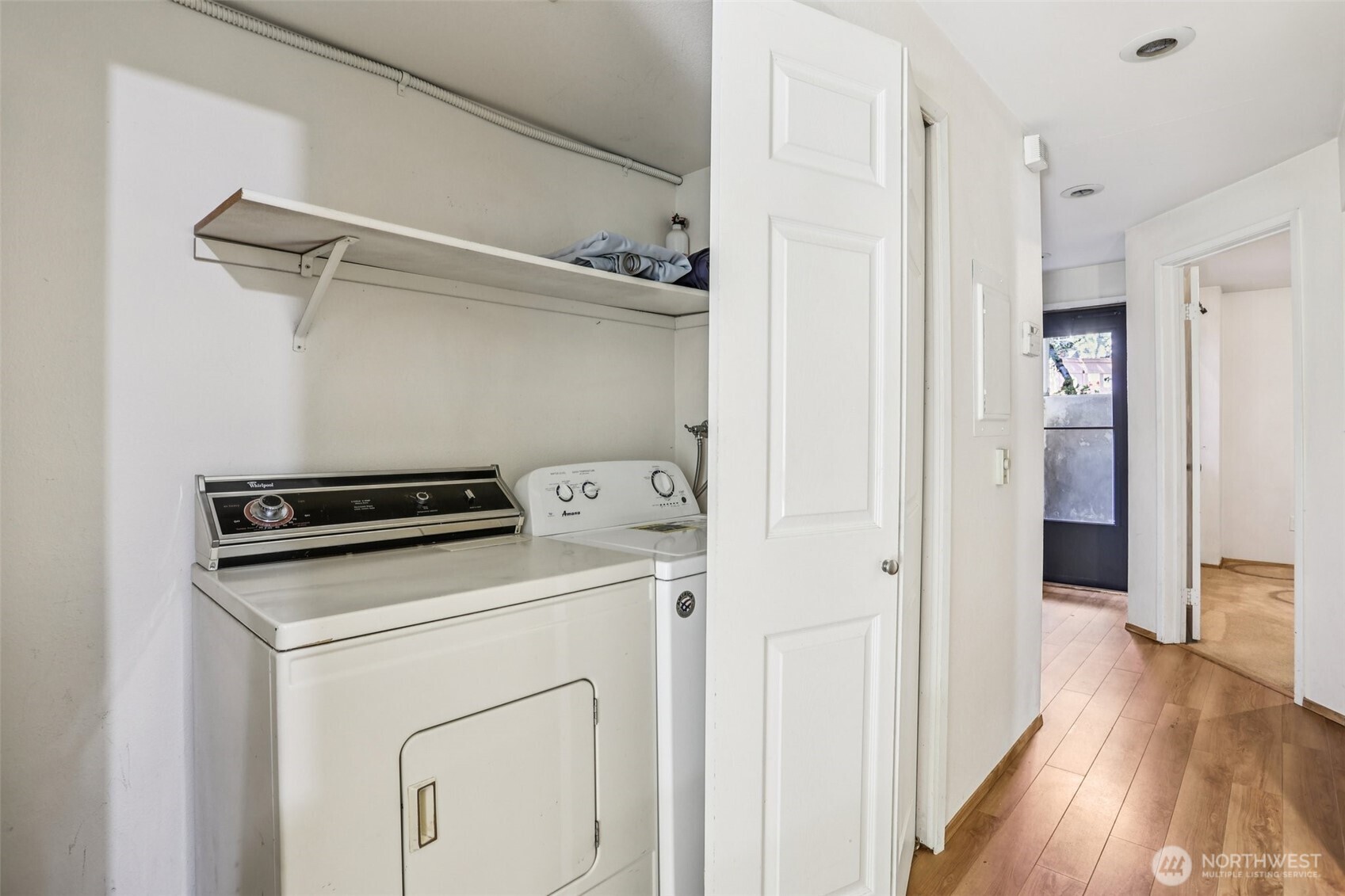 12044 96th Avenue Northeast, Unit 213 Kirkland, WA 98034 - Photo 11 of 24 a view of storage and utility room with washer and dryer