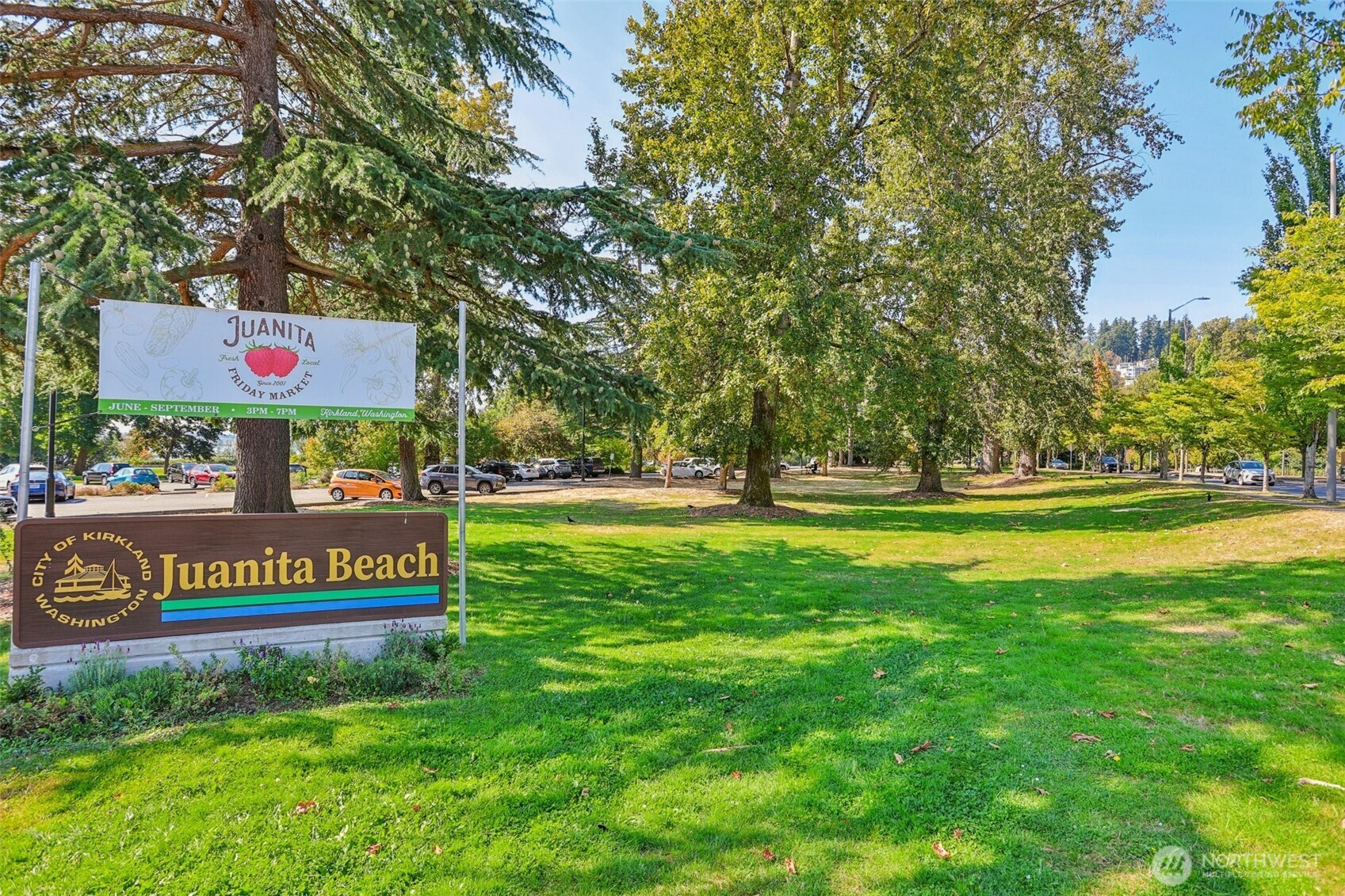 12044 96th Avenue Northeast, Unit 213 Kirkland, WA 98034 - Photo 14 of 24 a view of a park with welcome board
