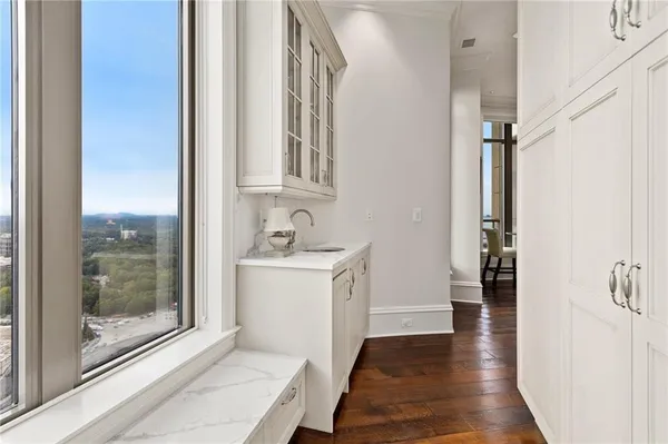 a view of bathroom with tub and shower