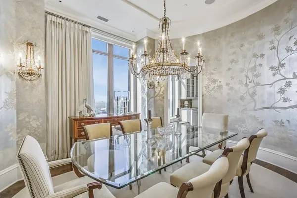 a view of a dining room with furniture window and outside view