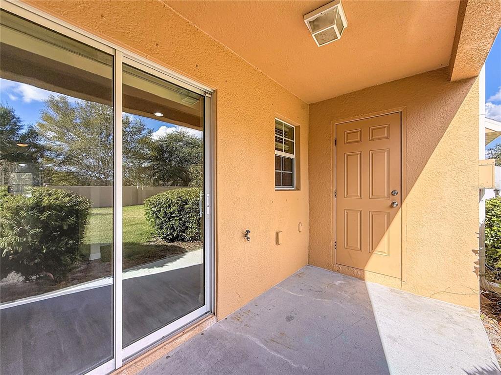 9873 Trumpet Vine Loop Trinity, FL 34655 - Photo 35 of 40 a view of a room with a large window