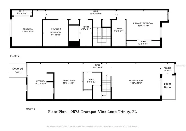 a view of a patio with couple of chairs and potted plants