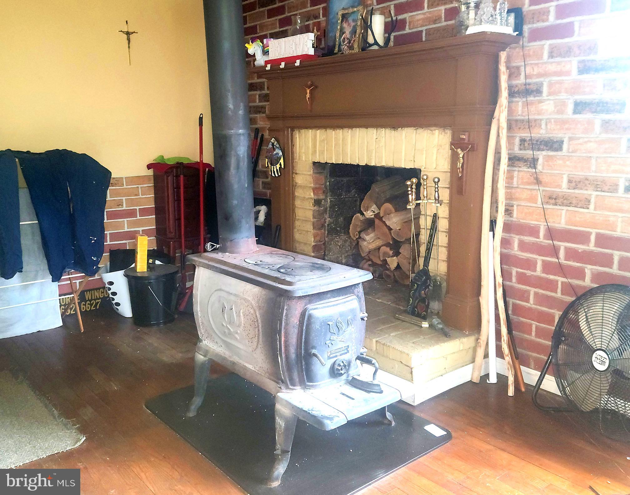 5703 Tobery Road Frederick, MD 21704 - Photo 22 of 36 Seller will remove wood stove if desires. FP works