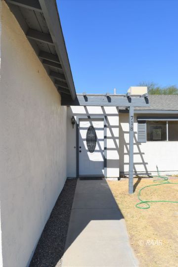 718 West Haloid Avenue Ridgecrest, CA 93555 - Photo 2 of 24 a view of swimming pool with a lounge chair