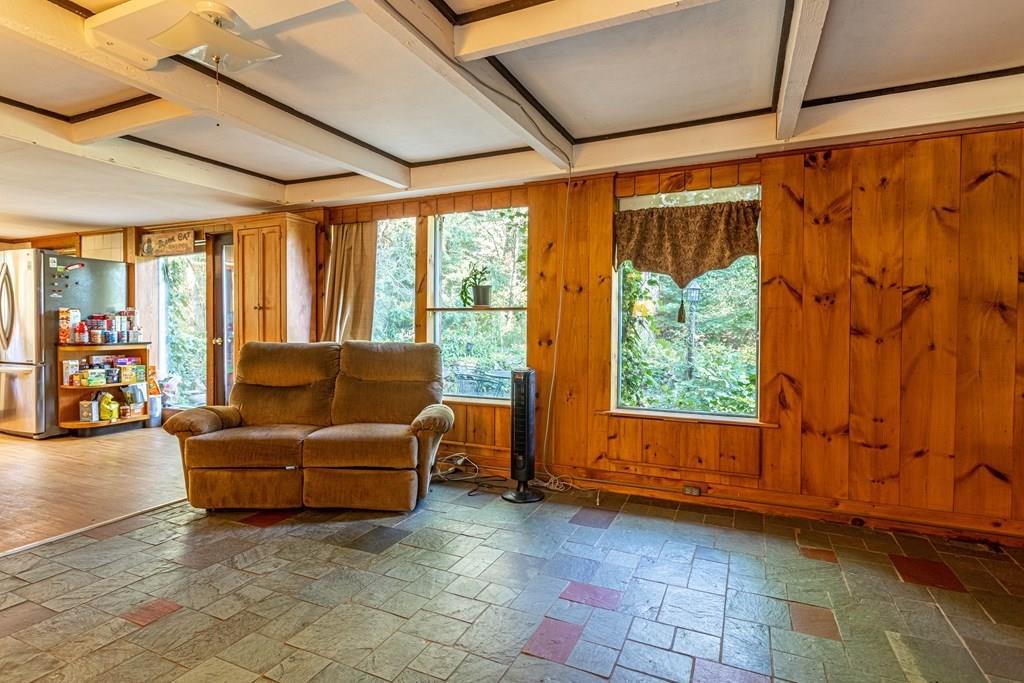 9 Foster Road Milford, NH 03055 - Photo 20 of 31 a living room with furniture and a large window