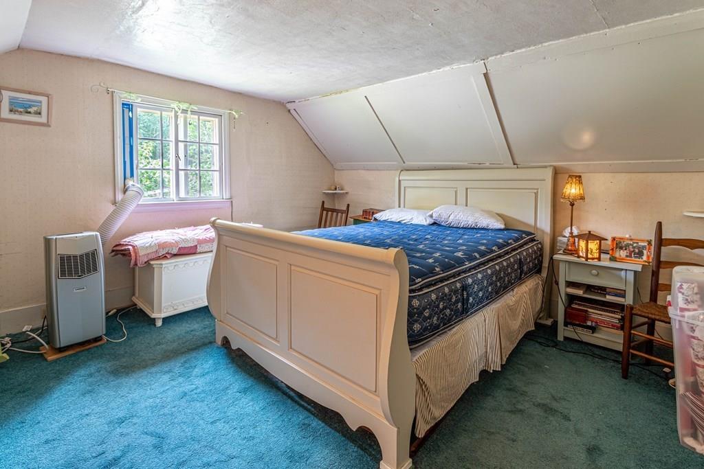 9 Foster Road Milford, NH 03055 - Photo 29 of 31 a bedroom with a bed and a window