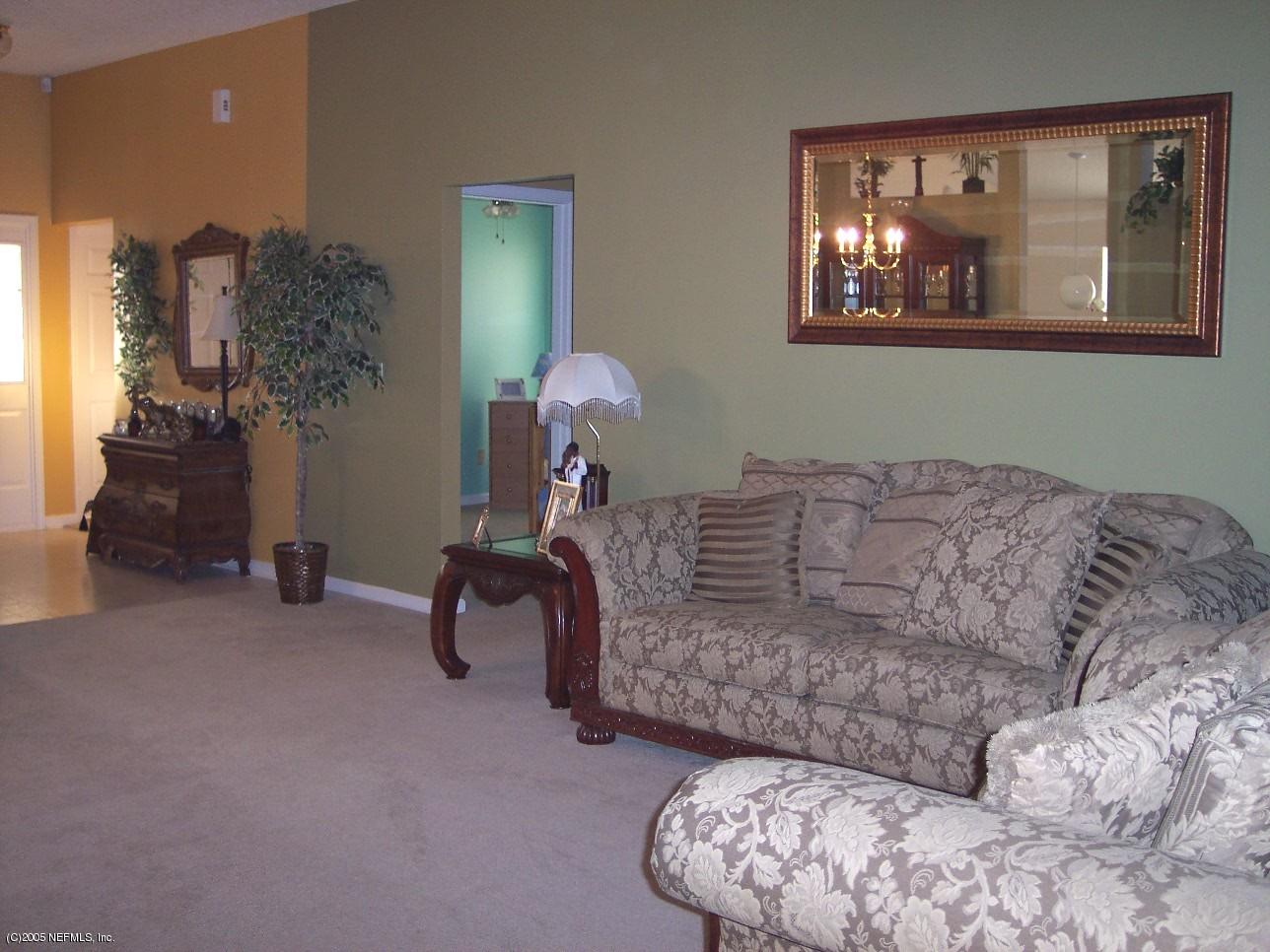 6885 Ridgeview Avenue Jacksonville, FL 32244 - Photo 4 of 18 LIVING ROOM TO FOYER