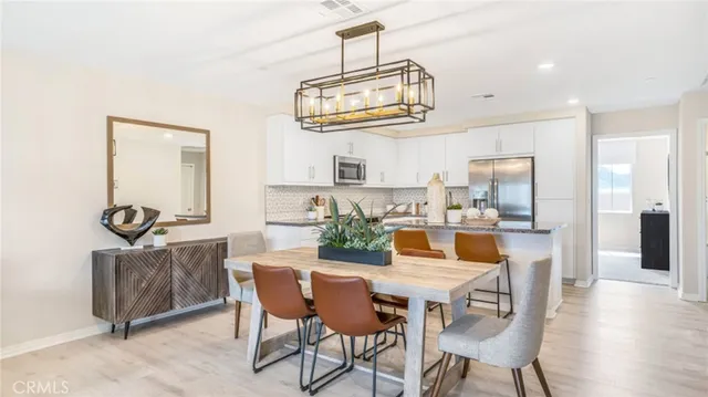 a view of a dining room with furniture