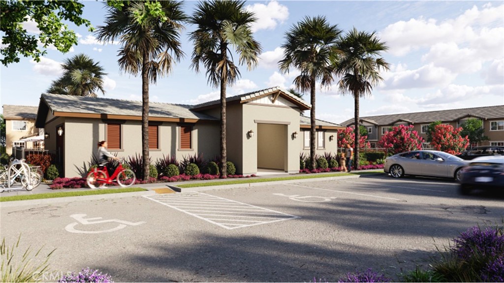 19128 Chestnut Grv Court Riverside, CA 92507 - Photo 18 of 20 a front view of a building with palm trees