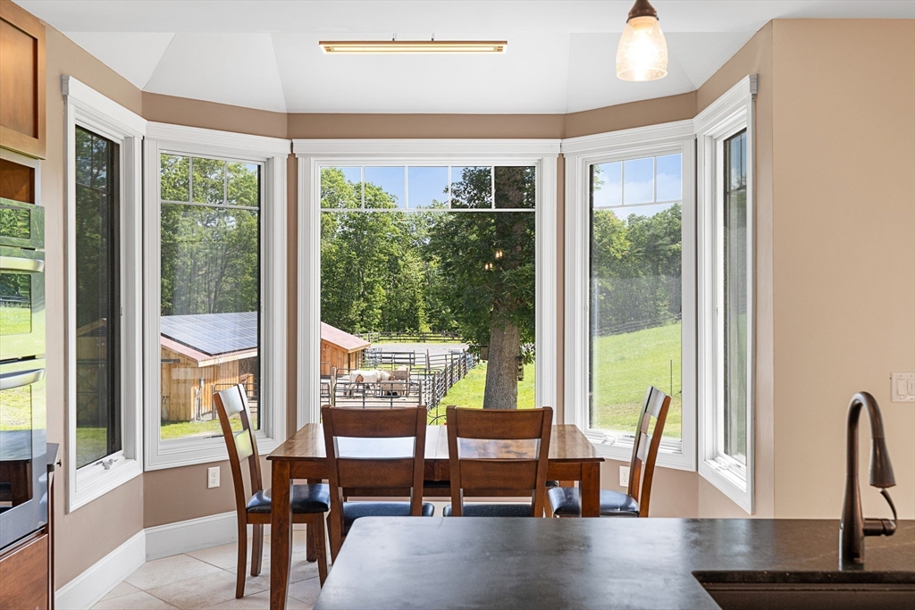 19 Hardscrabble Road Sterling, MA 01564 - Photo 17 of 42 a view of a dining room with furniture window and wooden floor