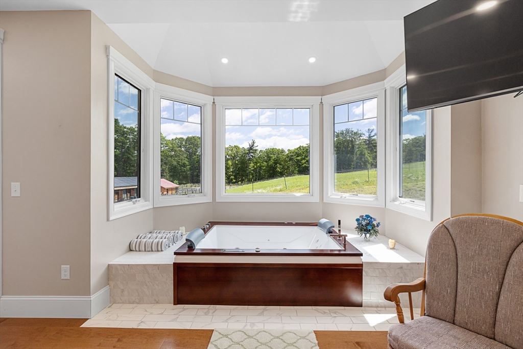 19 Hardscrabble Road Sterling, MA 01564 - Photo 21 of 42 a living room with furniture and large windows