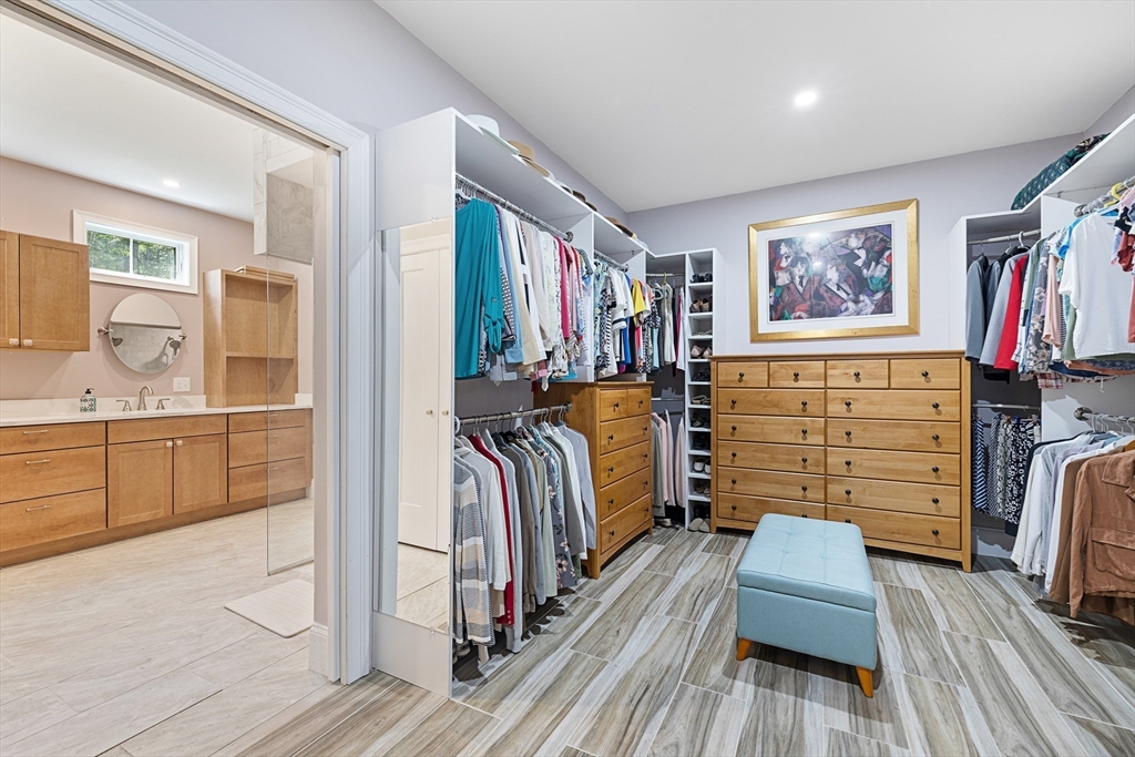 19 Hardscrabble Road Sterling, MA 01564 - Photo 24 of 42 a view of walk in closet with clothes and shoes