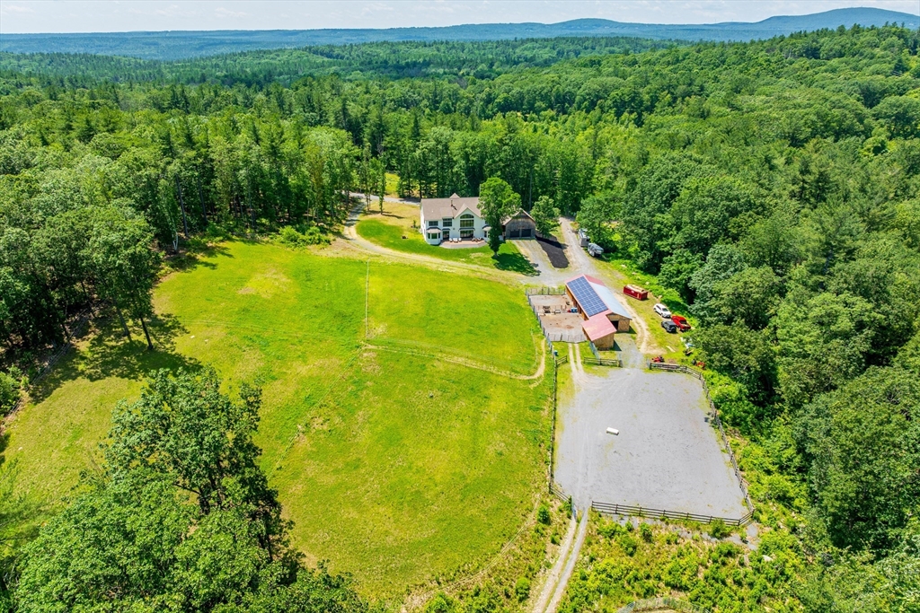 19 Hardscrabble Road Sterling, MA 01564 - Photo 3 of 42 a view of a swimming pool with a yard