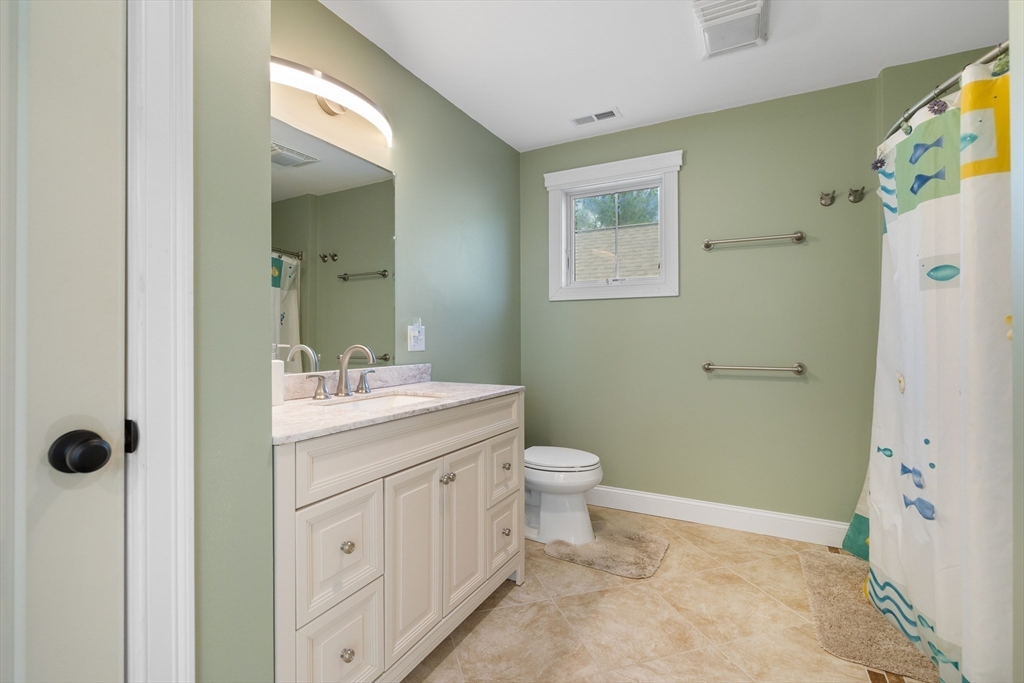 19 Hardscrabble Road Sterling, MA 01564 - Photo 33 of 42 a bathroom with a sink a toilet and shower