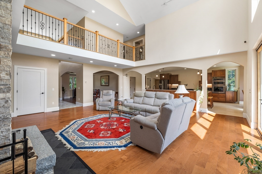 19 Hardscrabble Road Sterling, MA 01564 - Photo 10 of 42 a living room with furniture fireplace and rug
