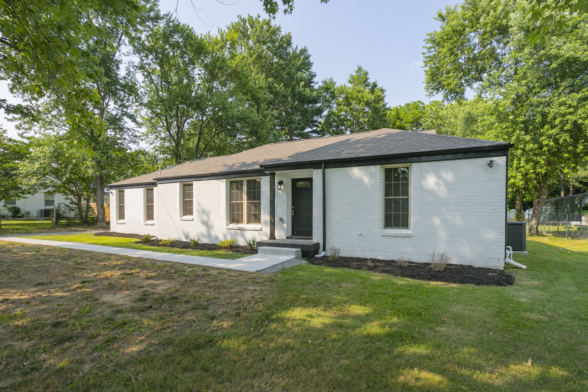 1229 Berwick Trail Madison, TN 37115 - Photo 1 of 47 a front view of house with yard and green space