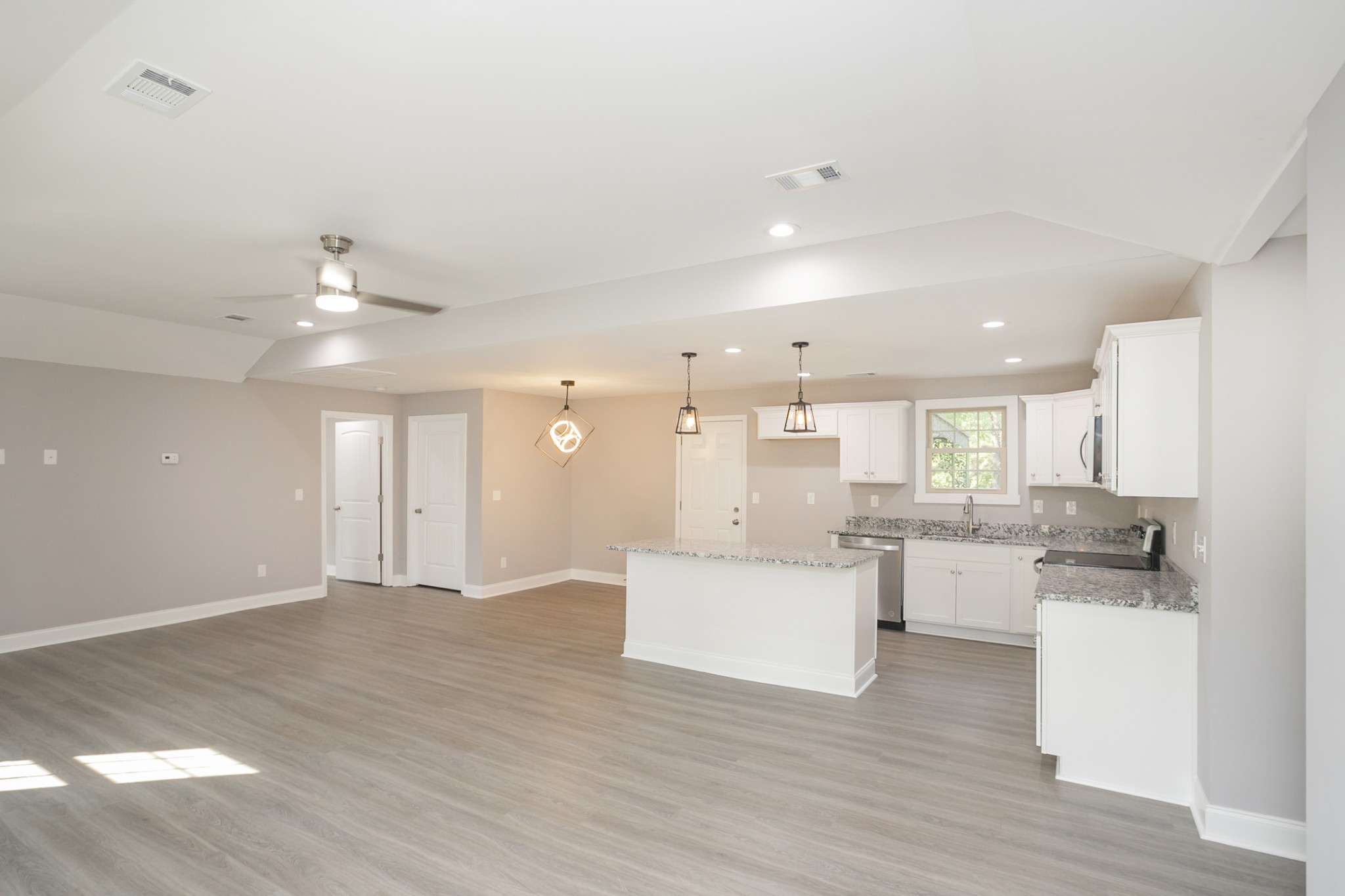 1229 Berwick Trail Madison, TN 37115 - Photo 14 of 47 a large white kitchen with cabinets
