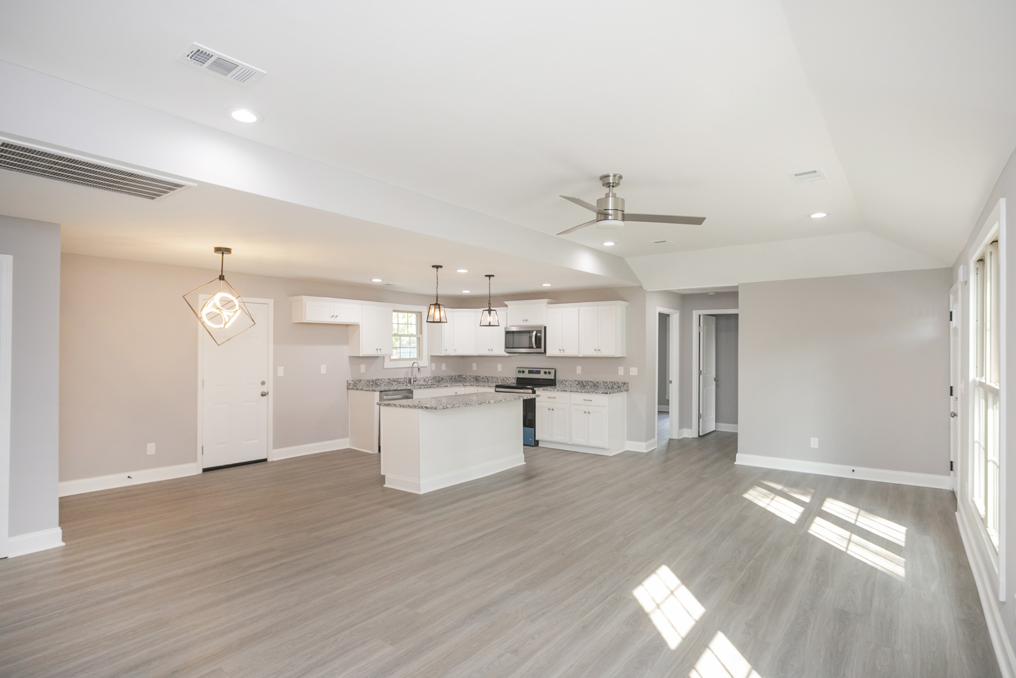 1229 Berwick Trail Madison, TN 37115 - Photo 15 of 47 a large kitchen with kitchen island a sink stainless steel appliances and cabinets