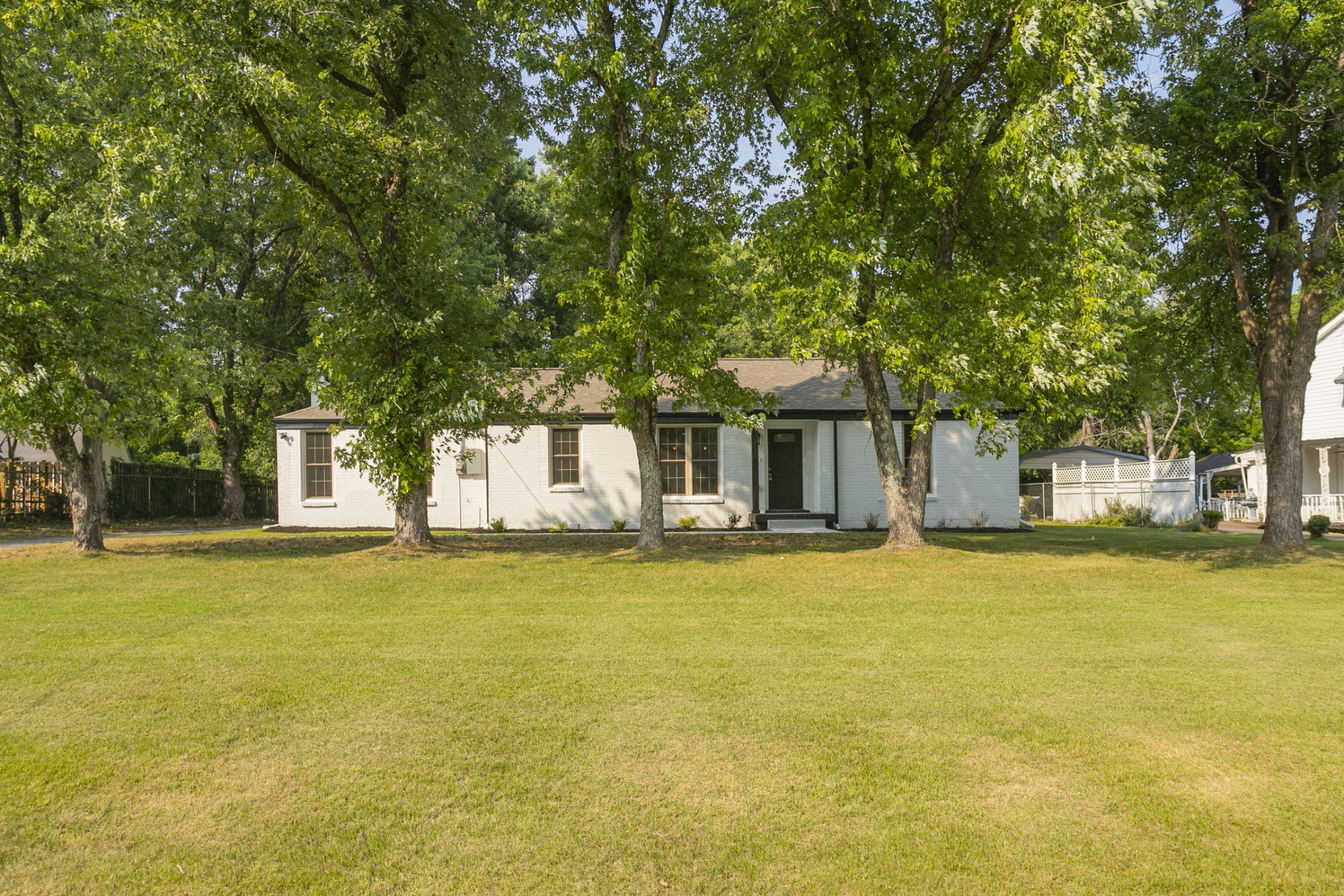 1229 Berwick Trail Madison, TN 37115 - Photo 2 of 47 a front view of a house with a garden