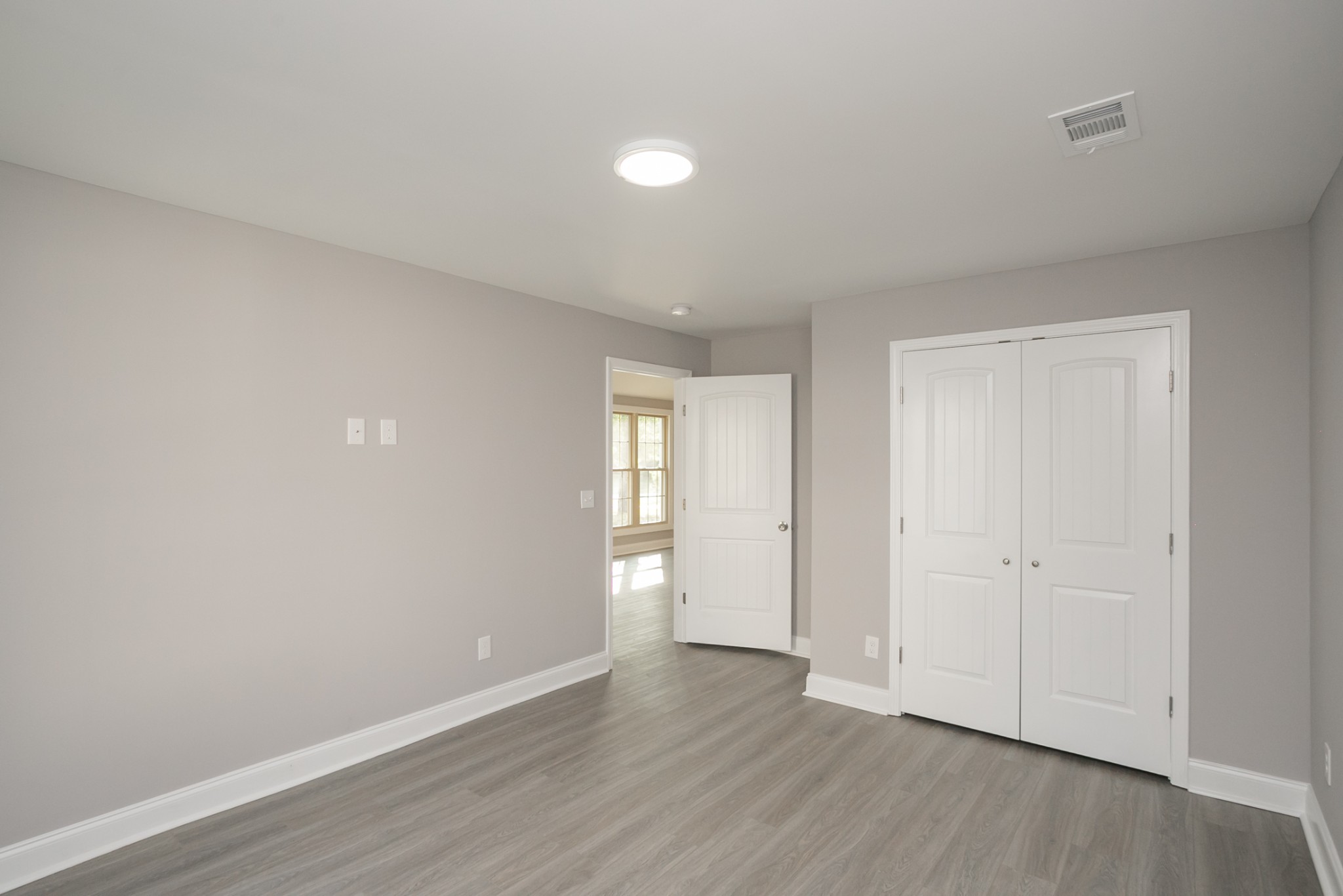 1229 Berwick Trail Madison, TN 37115 - Photo 32 of 47 a view of an empty room with wooden floor and closet