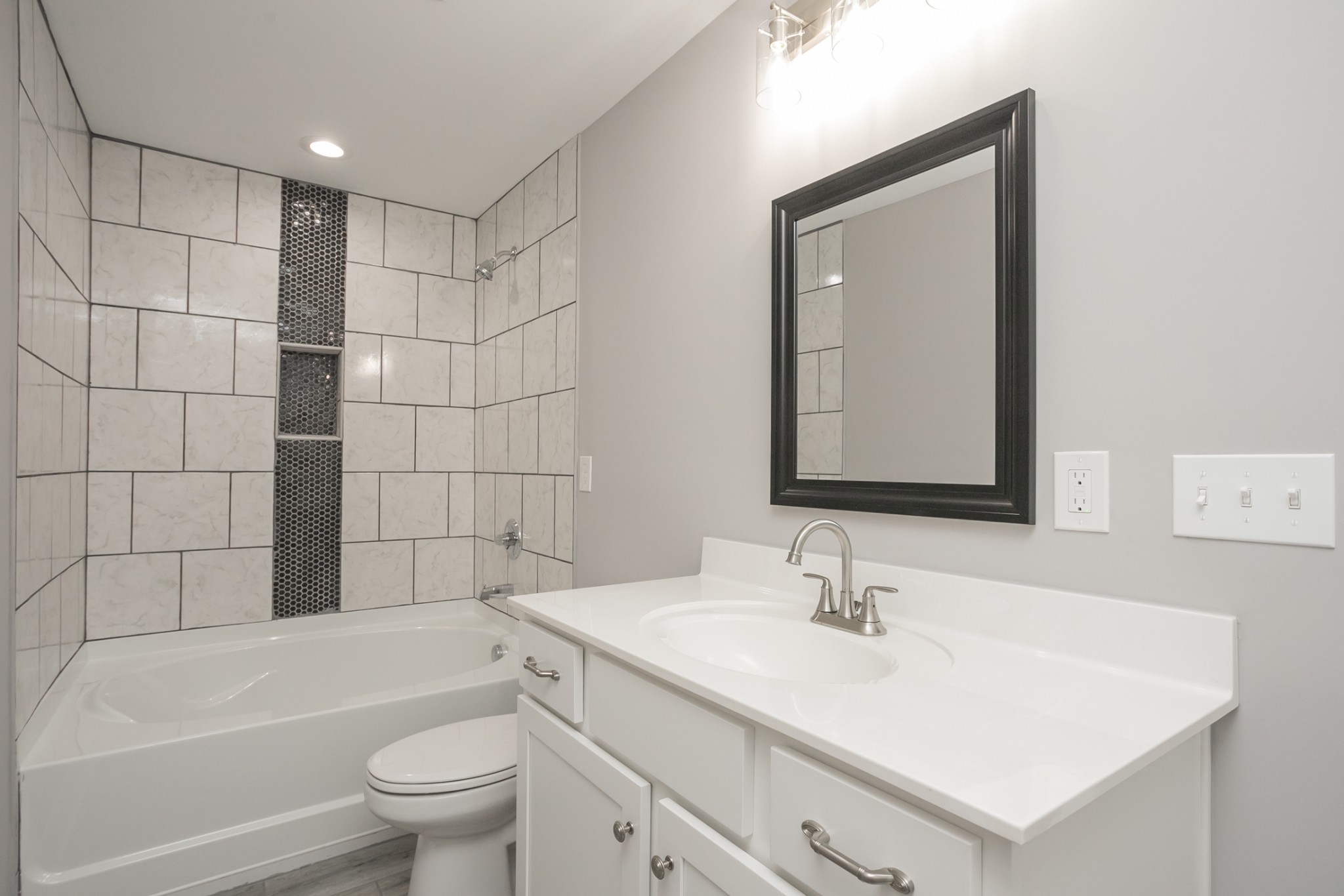 1229 Berwick Trail Madison, TN 37115 - Photo 35 of 47 a bathroom with a sink toilet a mirror and shower