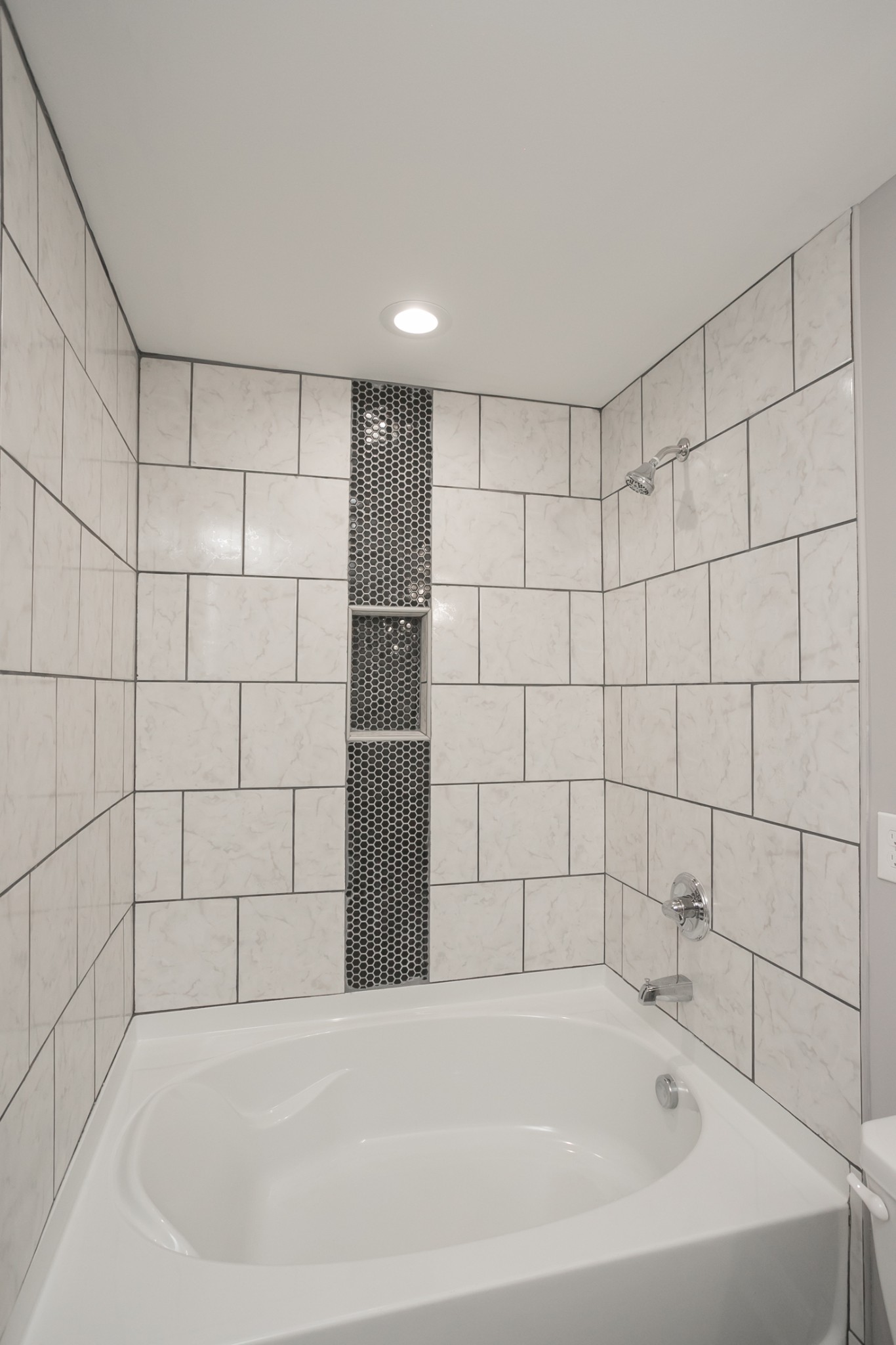 1229 Berwick Trail Madison, TN 37115 - Photo 36 of 47 a white bath tub sitting in a bathroom