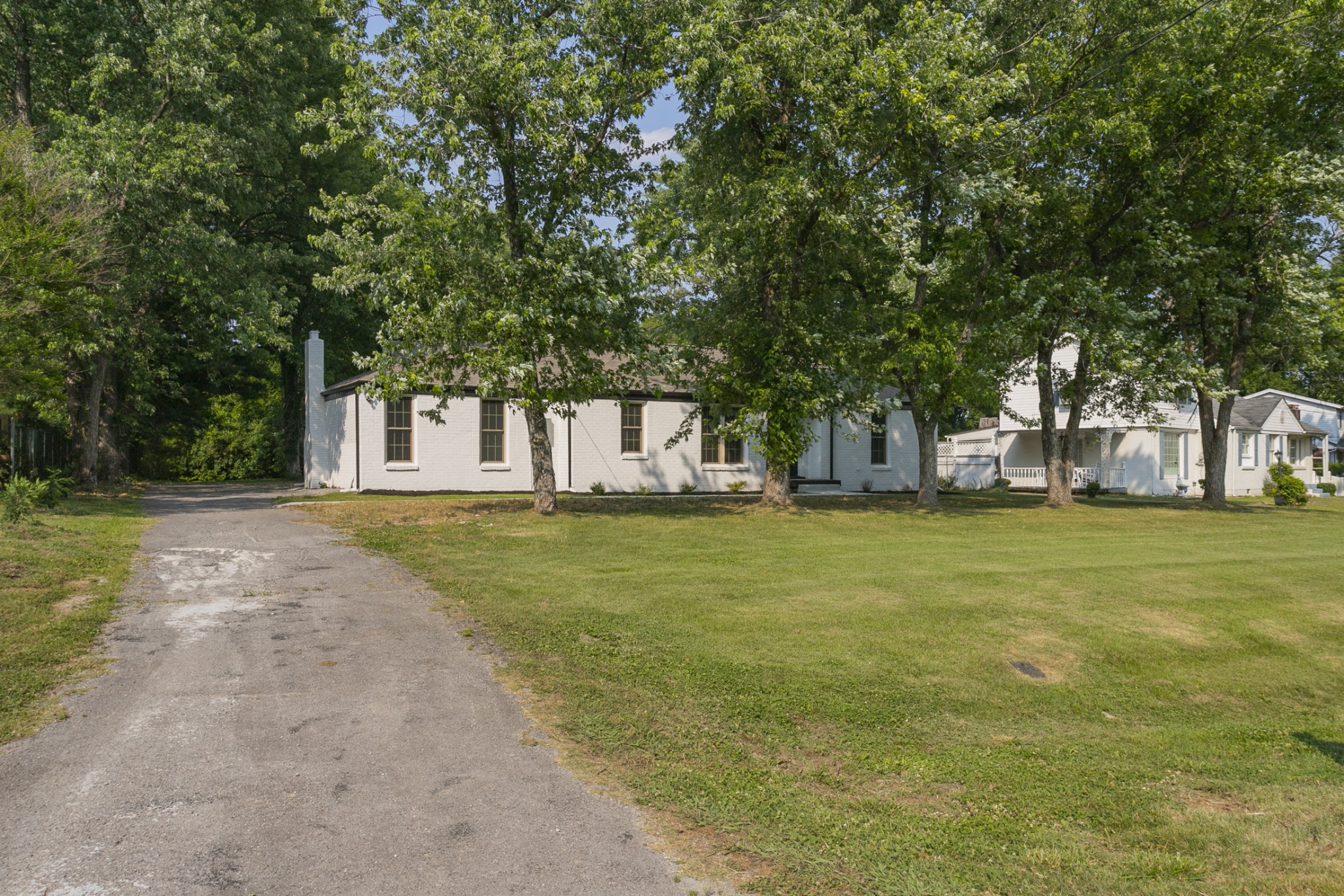 1229 Berwick Trail Madison, TN 37115 - Photo 8 of 47 a view of a swimming pool with large trees