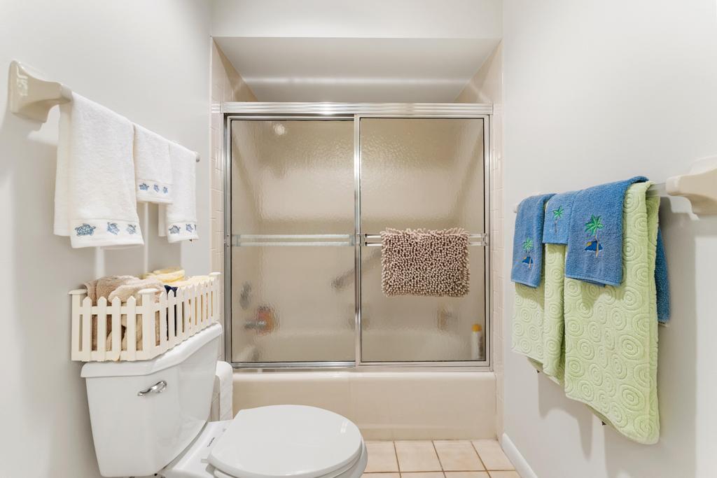 108 Pegasus Drive Jupiter, FL 33477 - Photo 35 of 74 a bathroom with a toilet and a shower