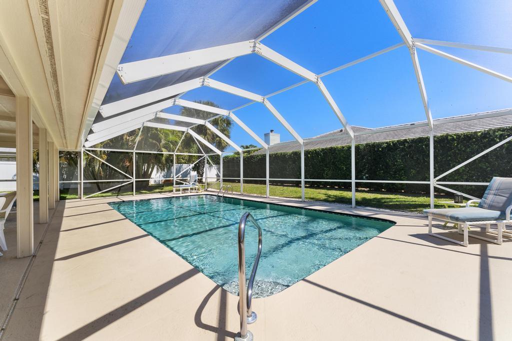 108 Pegasus Drive Jupiter, FL 33477 - Photo 45 of 74 a view of swimming pool with outdoor seating