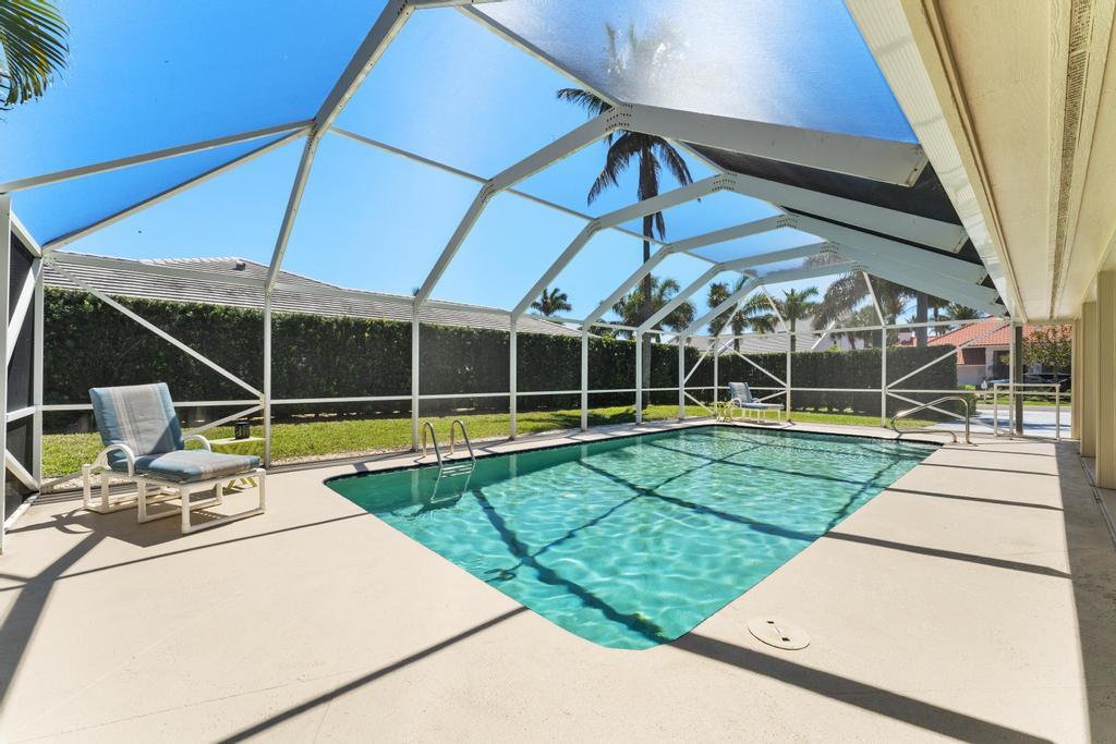 108 Pegasus Drive Jupiter, FL 33477 - Photo 51 of 74 a view of a house with backyard and sitting area