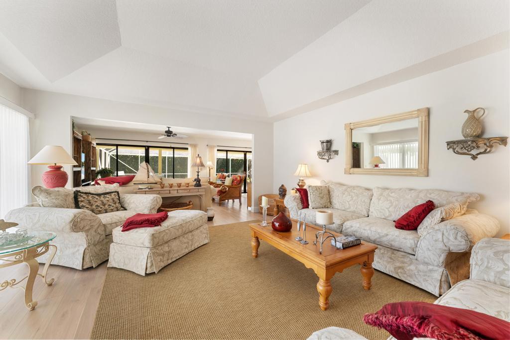 108 Pegasus Drive Jupiter, FL 33477 - Photo 6 of 74 a living room with furniture and a couch
