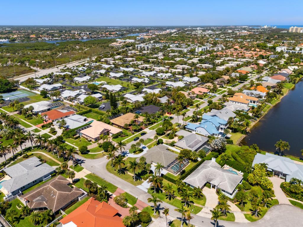108 Pegasus Drive Jupiter, FL 33477 - Photo 69 of 74 an aerial view of residential houses with outdoor space