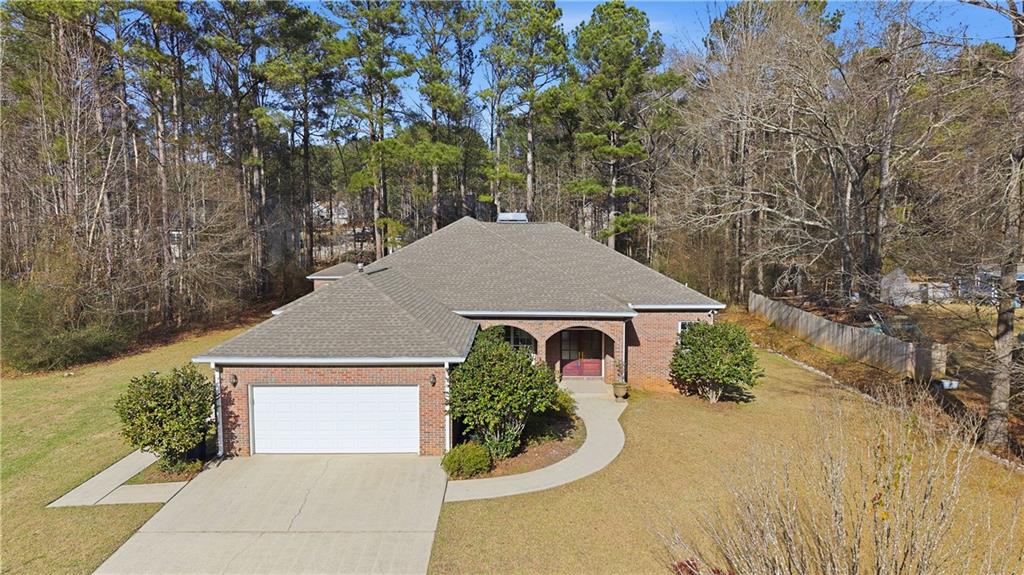 196 Lakeridge Drive Temple, GA 30179 - Photo 2 of 62 front view of a house with a yard
