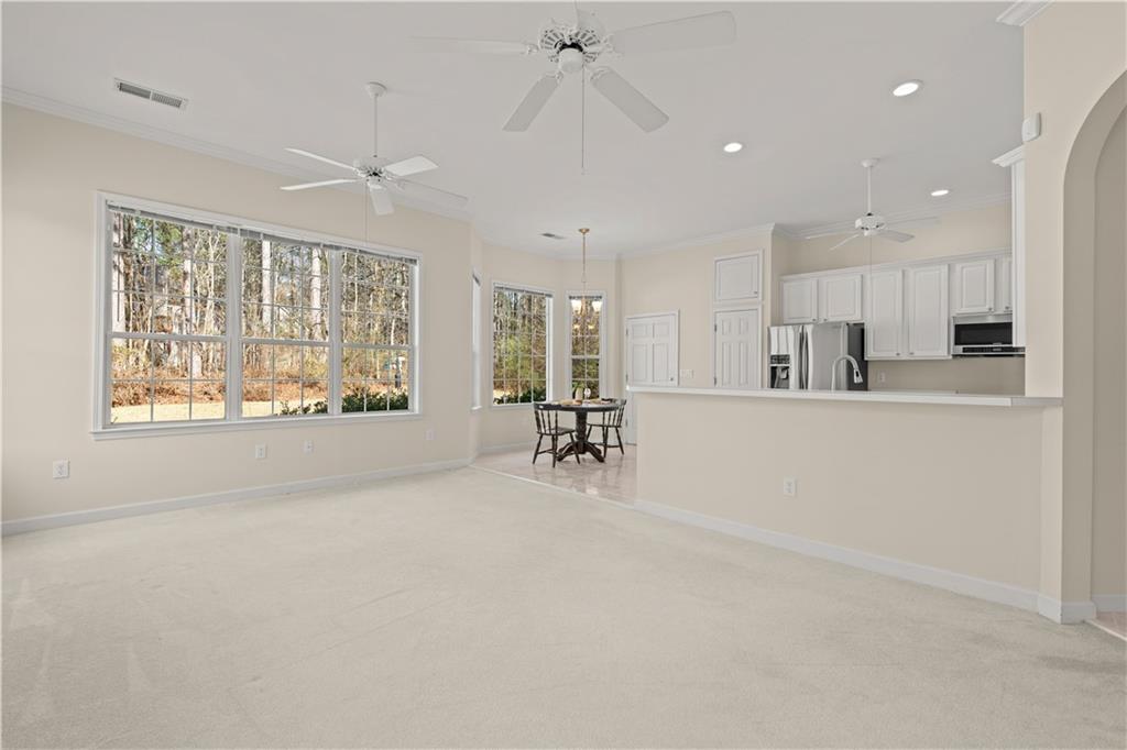 196 Lakeridge Drive Temple, GA 30179 - Photo 21 of 62 a view of a kitchen with refrigerator and a large window