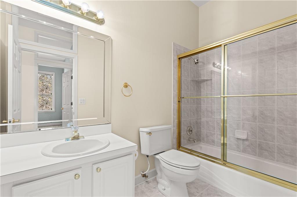 196 Lakeridge Drive Temple, GA 30179 - Photo 36 of 62 a bathroom with a sink toilet and shower