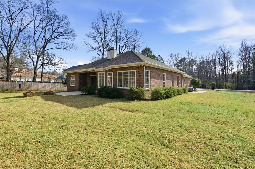 196 Lakeridge Drive Temple, GA 30179 - Photo 50 of 62 a view of a house with a yard