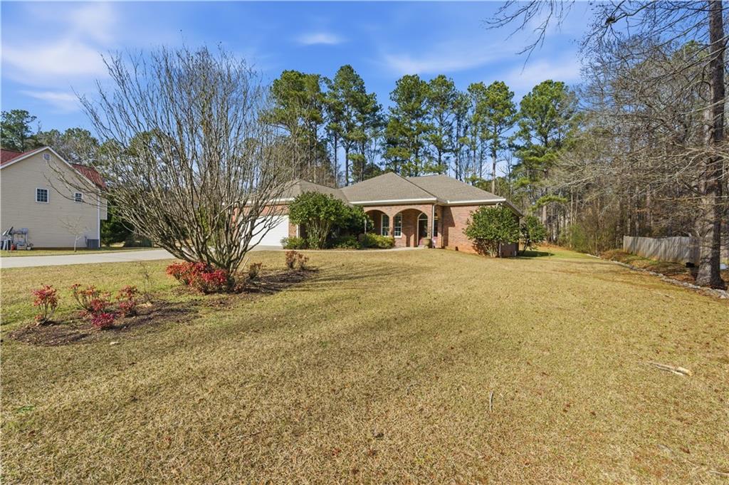 196 Lakeridge Drive Temple, GA 30179 - Photo 60 of 62 a view of a outdoor space with garden