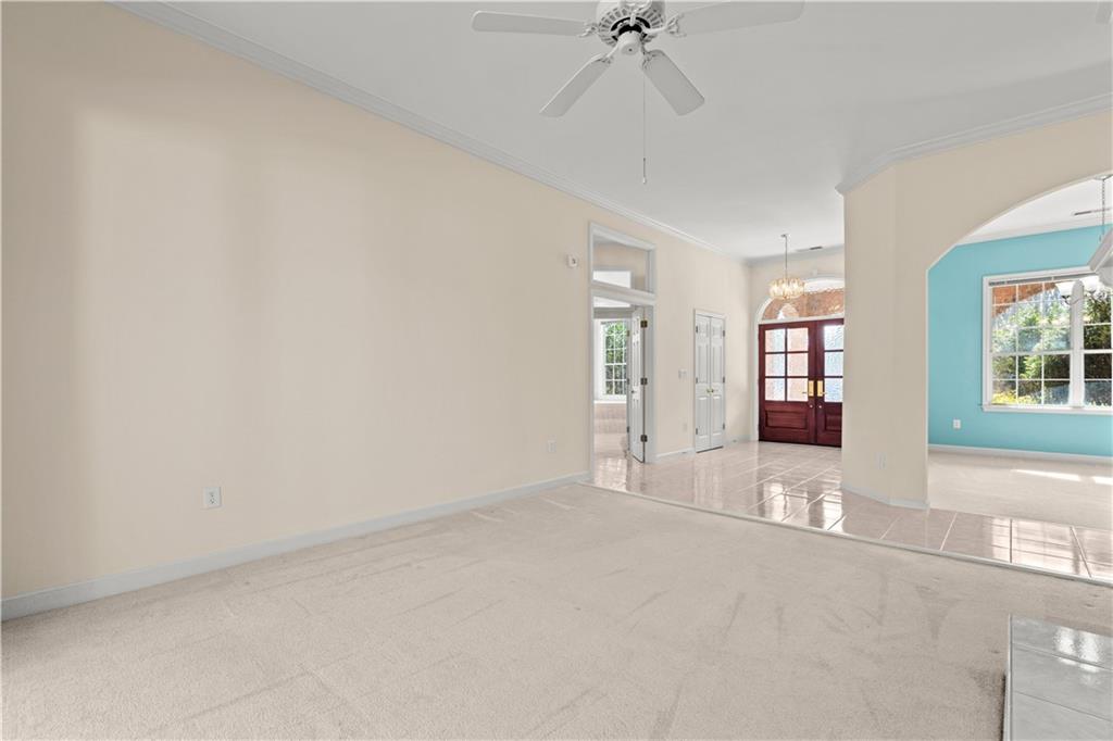 196 Lakeridge Drive Temple, GA 30179 - Photo 10 of 62 wooden floor in an empty room with a window