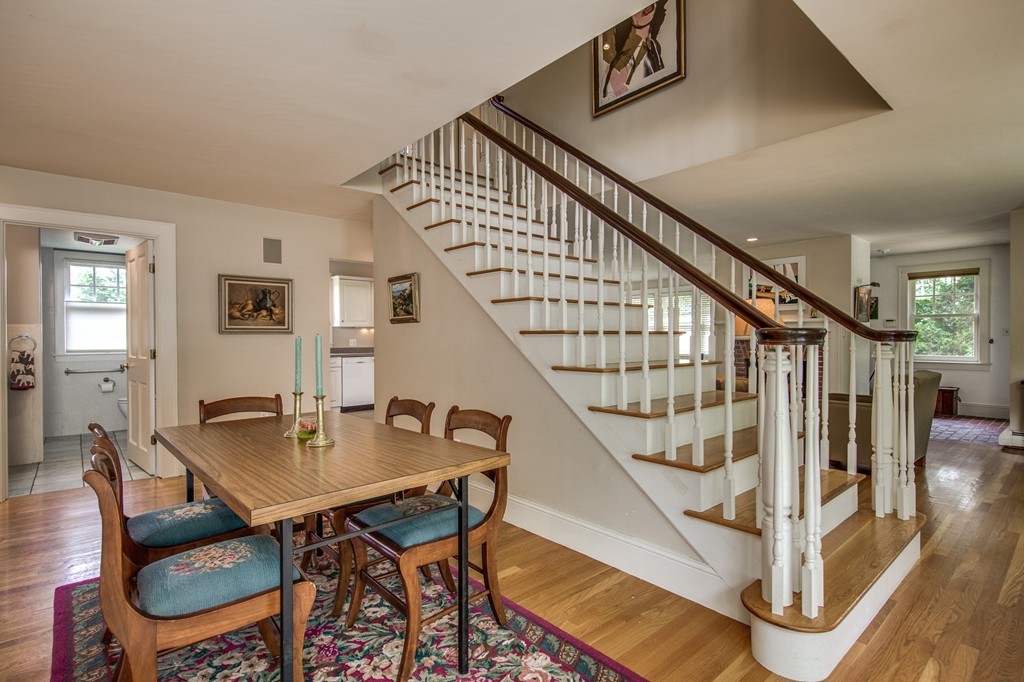 86 Eastern Point Boulevard Gloucester, MA 01930 - Photo 11 of 30 a view of livingroom and dining room with wooden floor