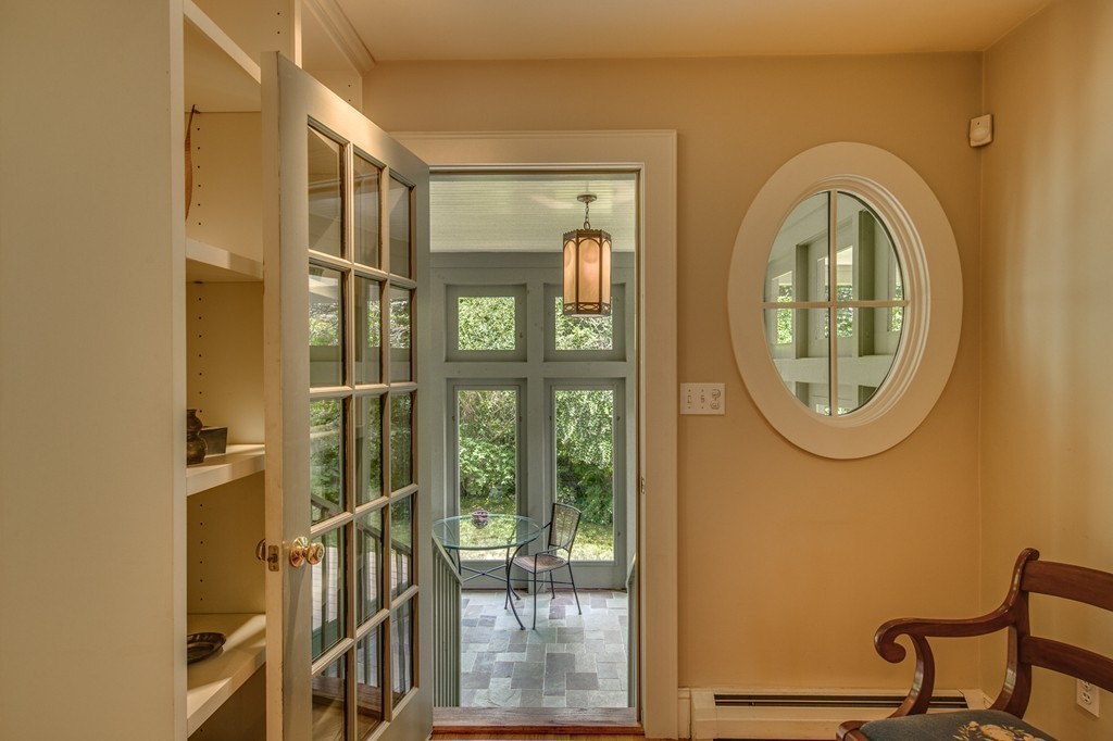 86 Eastern Point Boulevard Gloucester, MA 01930 - Photo 19 of 30 a front view of a house with a glass door