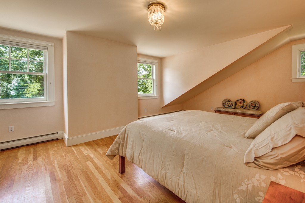 86 Eastern Point Boulevard Gloucester, MA 01930 - Photo 25 of 30 a bedroom with a bed and a window