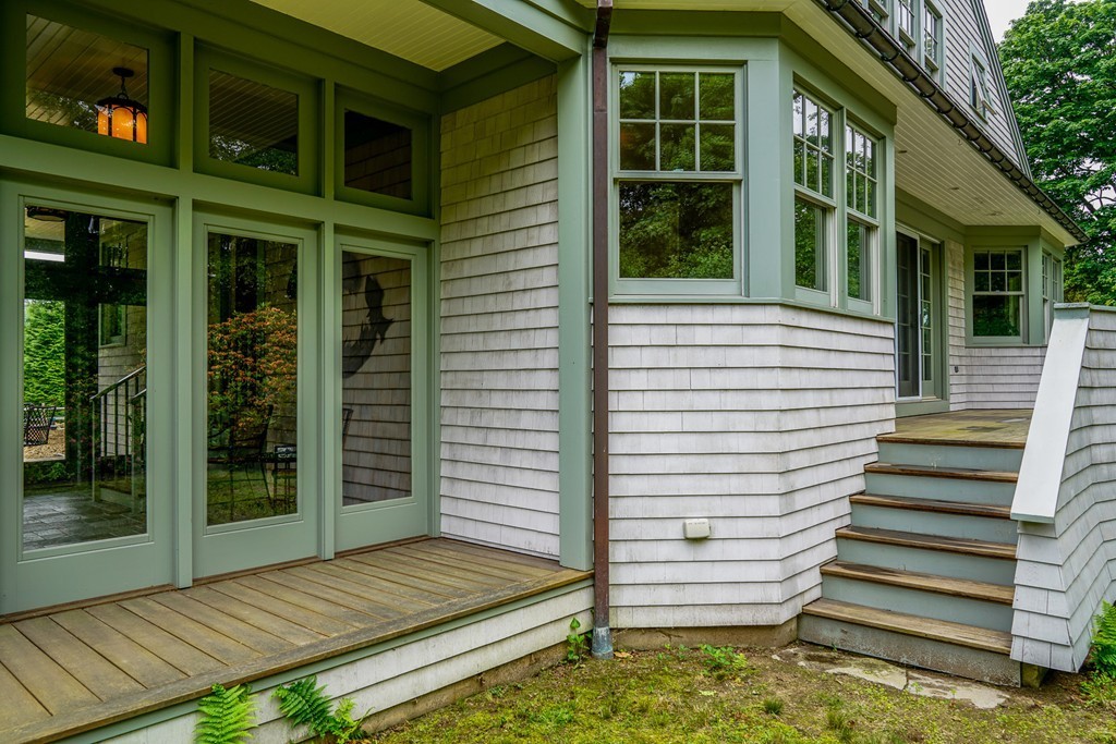 86 Eastern Point Boulevard Gloucester, MA 01930 - Photo 3 of 30 a view of house with backyard and glass windows