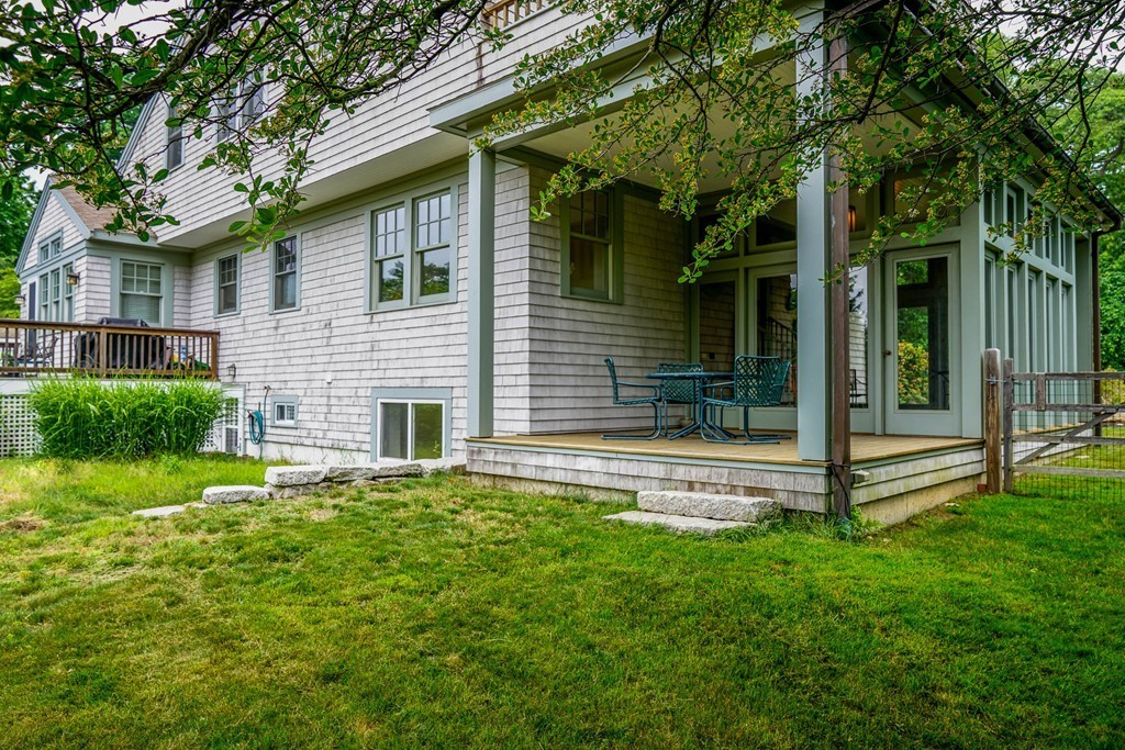 86 Eastern Point Boulevard Gloucester, MA 01930 - Photo 4 of 30 a view of a house with a yard and tree